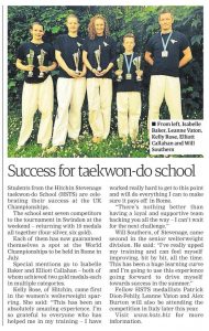 Five students proudly hold trophies, standing in front of a UKITF banner. They celebrate their success at a taekwondo competitions Finals Night. Text surrounding the image highlights their achievements and the unwavering support from coaches and family. - HSTS Taekwon-Do
