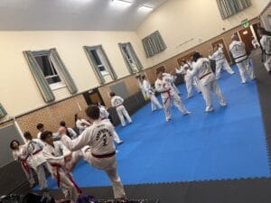 Adults training Taekwon-Do for fitness and self-defence in a Hitchin
